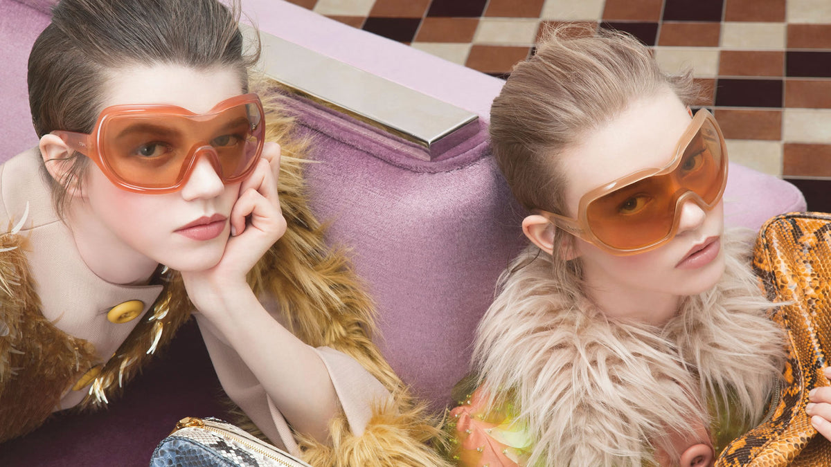 Models wearing iconic fashion.